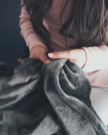 Traveler feeling soft blanket